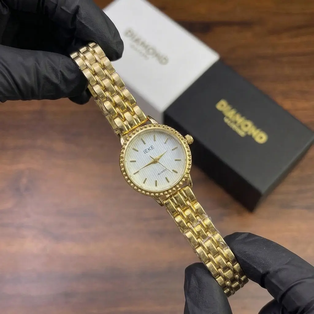 Elegant Gold Textured Dial Women's Watch